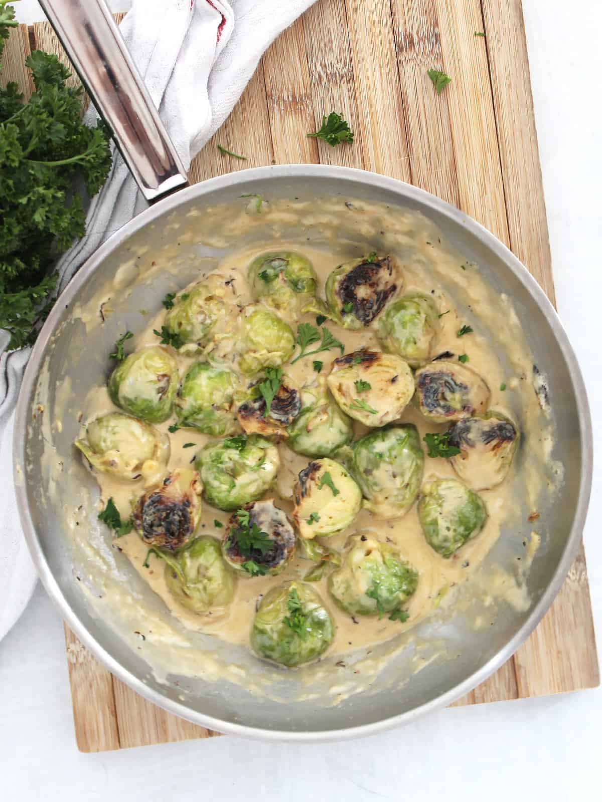 Sautéed Brussels Sprouts in Cream Sauce (Creamed Brussels Sprouts Recipe) - Bite On The Side
